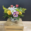 a colorful selection of in season flowers in our beautiful bubble vase