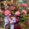 Pink flowers in purse box