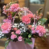 Pink and white flower bouquet with purse box