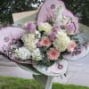 This is very unique arrangement with a beautiful butterfly wings. The flowers