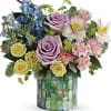 This alluring bouquet features lavender roses, light yellow spray roses, pink alstroemeria