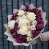 A dreamy, fragrant bouquet overflowing with spring charm. This lush composition features