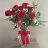 Experience the beauty and sophistication that this luxurious bouquet exudes. It includes