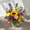 A cheerful bouquet full of vibrant colors that is sure to brighten