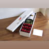 One dozen roses arranged in a premium white box. Express your love