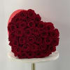 Preserved red roses in a red velvet Heart Shaped Box .Lasts one
