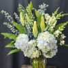 Premium Seasonal blooms like peonies, Ranunculus, Anemones, Garden Rose and  so