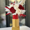 Introducing a stunning arrangement of red and white roses in a lipstick