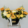 Inside a chic vase, the vibrant hues of summer come alive. Yellow