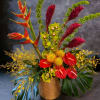 This tropical sympathy arrangement is perfect for those who loved beach vacations.