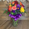 Delightful bouquet of purples, yellows, oranges, reds and more! This bright, elegant