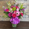 Pretty pink bouquet of roses, gerber daisies, snapdragons, stock and carnations.