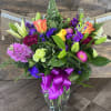 Radiant bouquet of bright and beautiful colors in roses, stock, lilies and