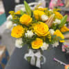 Yellow roses , lilies and carnations 