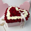 Indulge in the timeless elegance of our luxurious heart-shaped box filled with