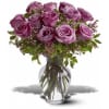 12 purple roses, with variegated pittosporum and salal, arrive in a classic