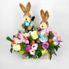 wood square vase with tulips, roses, hydrangeas, and fillers with two bunnies