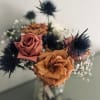 This gorgeous arrangement is designed and arranged with fresh cut roses and