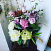 This bouquet is arranged with flowers chosen by our florists.
Not sure what
