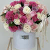 Experience the elegance of a delicate floral arrangement with our box of