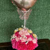 Carnations and baby breath on a pink bucket with chocolates and custom