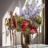 Gorgeous tropical flower arrangement with vibrant colors from Garden of Eve Paradise.