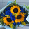 This handheld bouquet is created with beautiful royal blue roses and sunflower