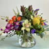 Beauty abounds in this mix of vibrant colorful tropical blooms.