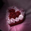 ROSES WITH PETALS LIKE VELVET, IN A RED VELVET HEART-SHAPED BOX, THE