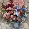 LILIANA INSPIRES LOVE IN A BEAUTIFUL PINK ARRANGEMENT WITH BABY BLUE ACCENTS