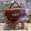 Fancy brown purse with gift inside