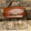 Fancy brown purse with gift inside