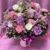 AN ARRANGEMENT AS SWEET AAS ITS COLORS! WITH A CUTE AND DELICATE