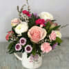 Arrangement designed in an 16oz Ceramic mug with a lavender and pink