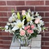 This beautiful bouquet will most certainly arrive in style! Ready for the