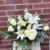A lovely bouquet to soothe and comfort, a variety of white and