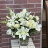 A lovely bouquet to soothe and comfort, a variety of white and