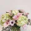 A delicate assortment of premium White and Light Pink Flowers. Soft and