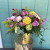 Designer's choice 
Roses and other flowers with lots of colors 