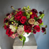 A gorgeous arrangement fit for royalty. This stunning design features a variety