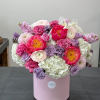 This luxurious floral arrangement is a breathtaking display of elegance and modern
