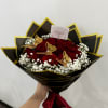 Radiant 24 roses adorned with delicate white baby breath, accented by three