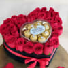 24 primiun roses,
10 Ferrero chocolates,
1 L heart box