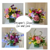 Trust our designer to create a beautiful, low and lush arrangement featuring