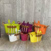Keepsake metal garden tin with miniature garden tools filled with fresh garden