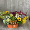 Keepsake metal garden tin with miniature garden tools filled with fresh garden