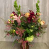 Assorted spring blooms in pinks and greens.