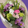 A seasonal collection of assorted flowers will be hand selected by a