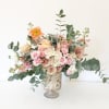 A sweet collection of soft pastel flowers and greens. Every arrangement is