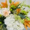 Experience the Joyful Beauty of Fragrant Lilies, Daisies, and Hydrangeas

Our stunning floral